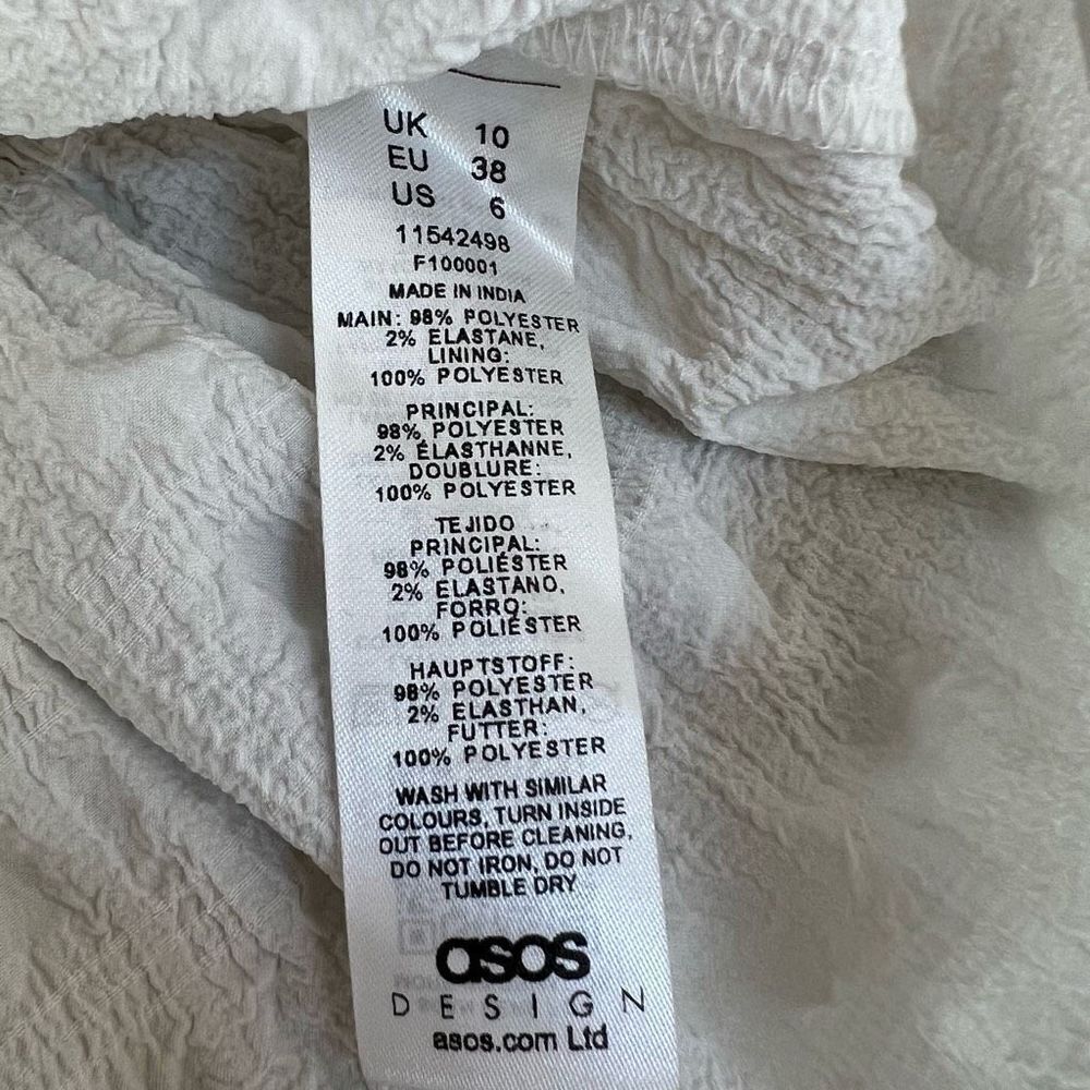 ASOS DESIGN tiered mini skirt in poly plaid in white size 6 - Picture 7 of 9